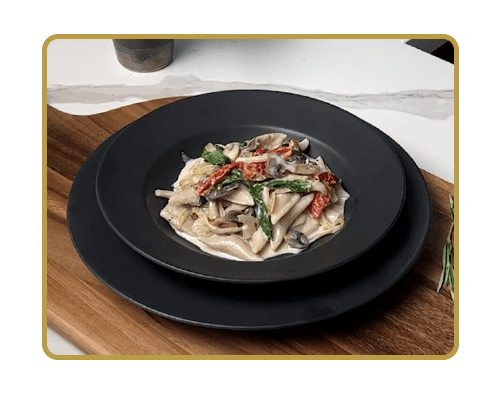 Triangle Ravioli with Creamy Forest Mushroom Sauce